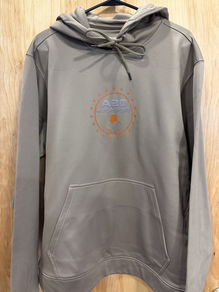 A2D Motorsports sand hoodie with orange Stars and State Alaska logo, hanging