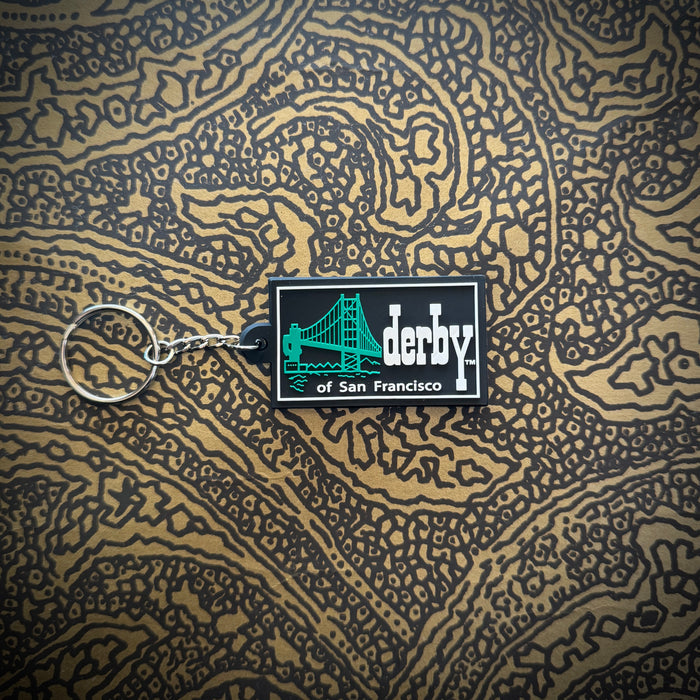 BLACK BACKGROUND, GREEN BRIDGE , WHITE LETTER PLASTIC KEYCHAINS